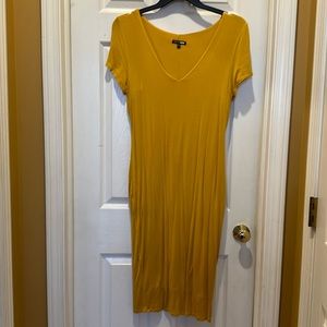 Yellow knee length body con dress